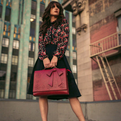 Graces elegante Tasche mit Fliege