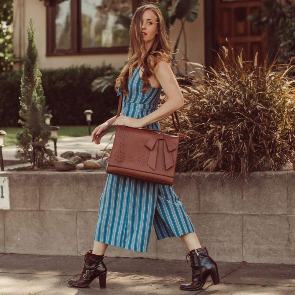 Graces elegante Tasche mit Fliege