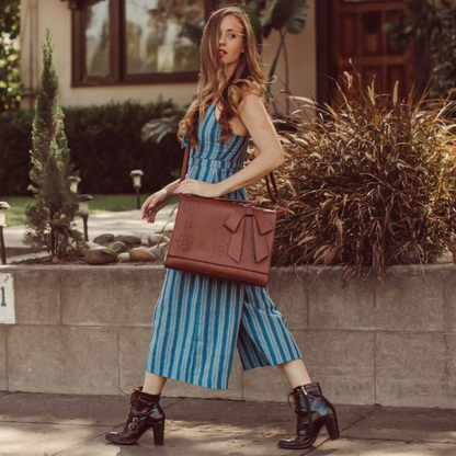 Graces elegante Tasche mit Fliege