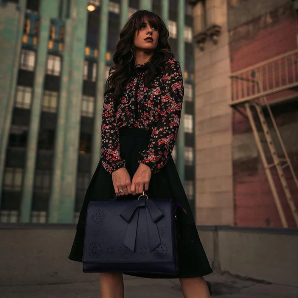 Graces elegante Tasche mit Fliege