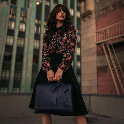 Graces elegante Tasche mit Fliege