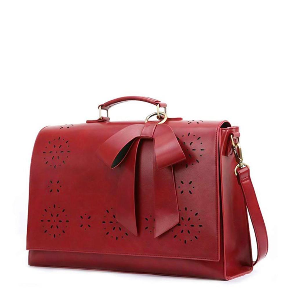 Graces elegante Tasche mit Fliege